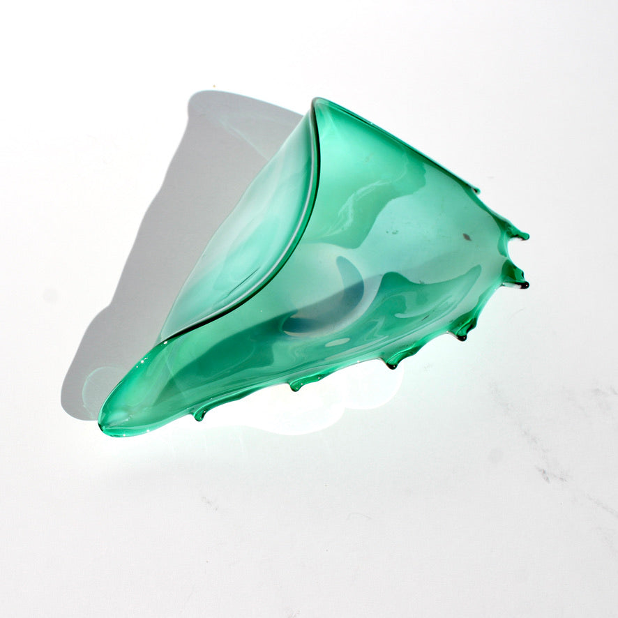 iridescent green glass shell